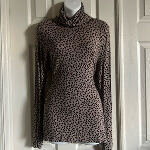 Black and tan, long-sleeved leopard print turtleneck. Super stretchy fabric.